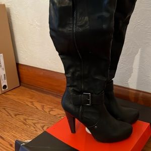 Black platform thigh high boots